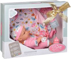 Poupée bébé avec bras, jambes et tête mobiles. L'ensemble comprend :  une tétine, un biberon, un bavoir et une serviette. https://etoilejouet.ma/wp-content/uploads/2024/09/tutu-baby-doll.jpg