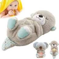 Breathing Otter Soothe ‘N Snuggle peluche apaisante avec respiration simulée pour bébé.